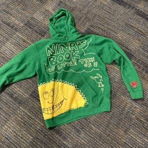 Green Graphic Hoodie with Yellow Sun Design